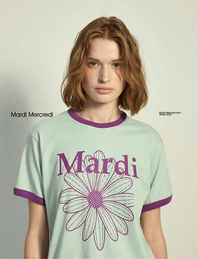 la fleur de ce mardi violet et vert